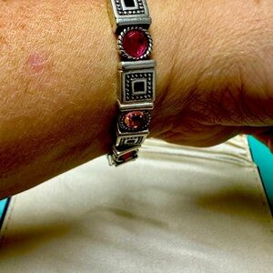 Unique stretchable silver bracelet with pink and red gemstones